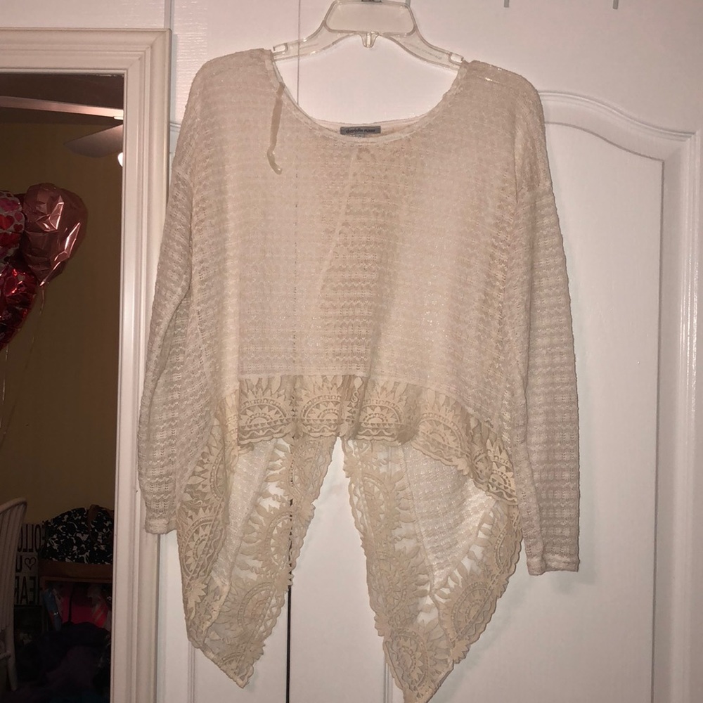 beige top with a butterfly back